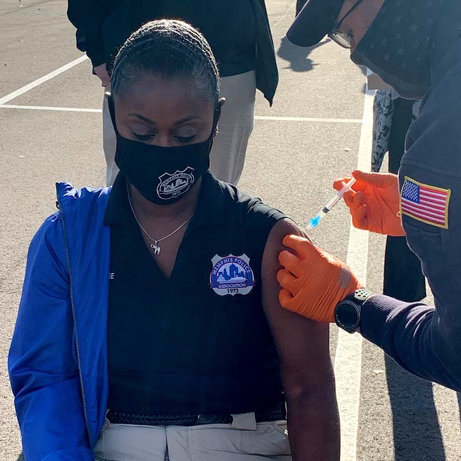 Memphis Police Association President Essica Cage receives first dose of the vaccine.